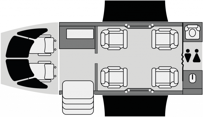 Plano interior del Embraer Phenom 100 con distribución de 4 asientos ejecutivos